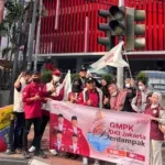 DPD GMPK DKI Bagikan 10.000 Masker dan 700 Nasi Kotak